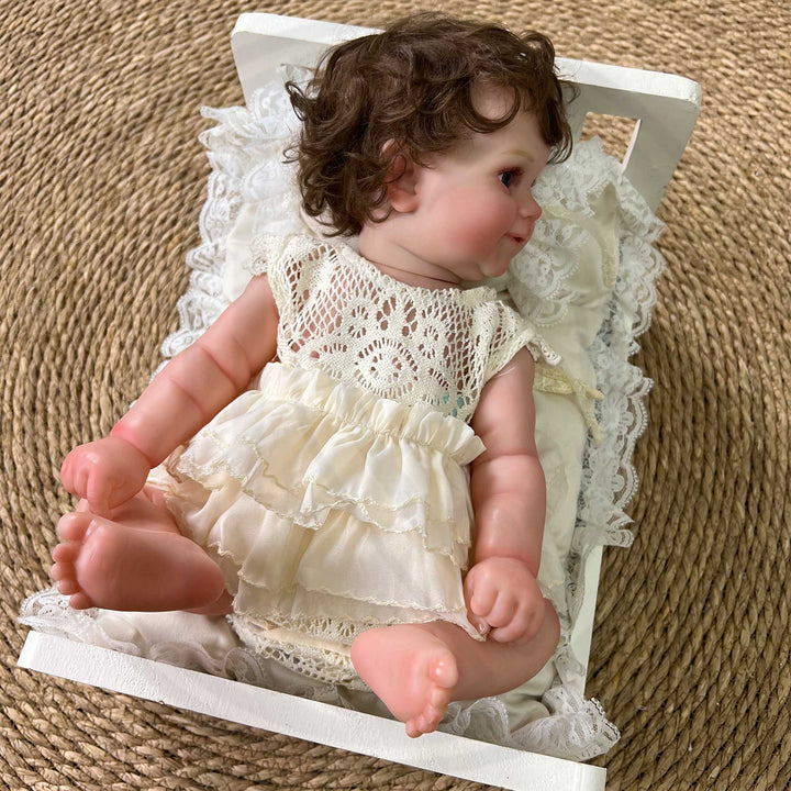 A 3-piece set featuring a tufted pearl white posing cushion and pillows with lace trim for newborn photography.