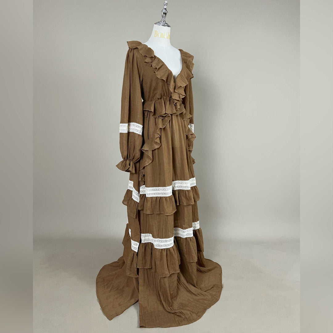 Cassandra dress on a mannequin, shot from an oblique side angle, with the train spread to both sides.