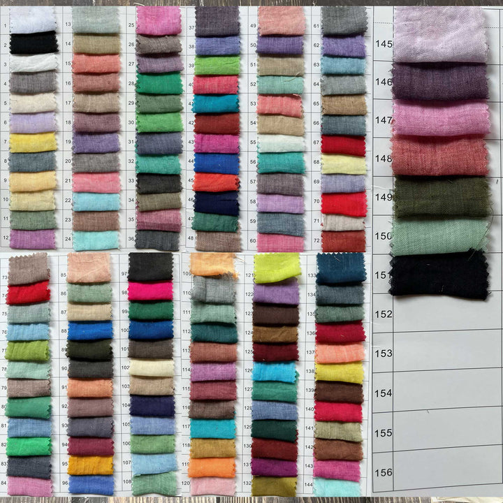 A large grid of small fabric swatches in many colors arranged on a white measurement chart with printed numbers. This is a Kallectoria dress color-options reference image rather than a single product photo, so subject_type is Color Swatch.