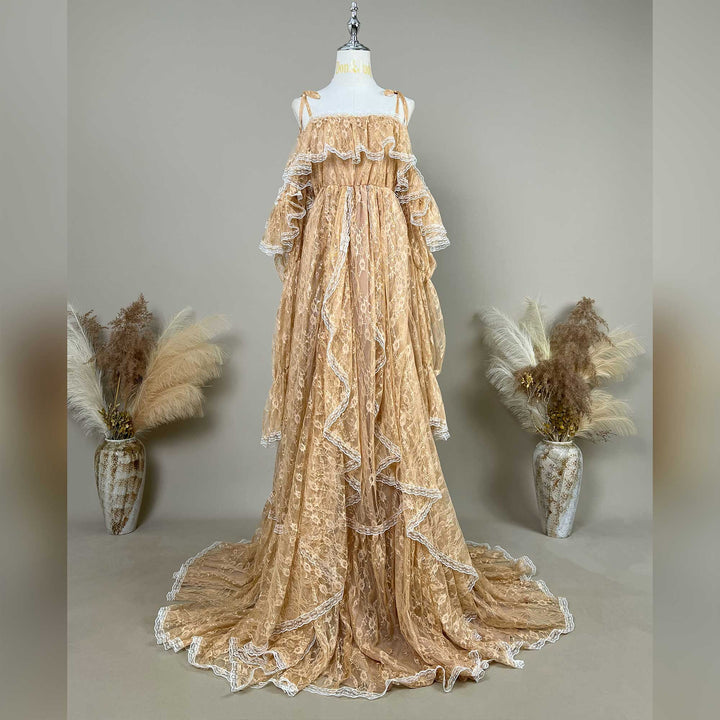 A Melinoe khaki lace tiered ruffle off shoulder maternity photography dress displayed on a mannequin.